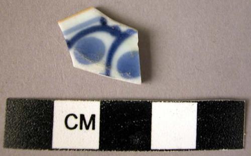 Rim potsherd - blue on white glaze