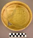 Fine geometric black-on-yellow pottery bowl