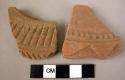 2 potsherds - red-brown, incised