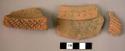 3 rim potsherds - red-brown, relief and incised