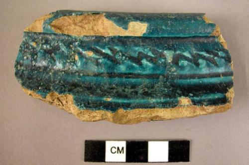 Rim potsherd - imported peacock-blue-green glaze (alkali), incised decoration