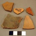 Red and black-on-red potsherds