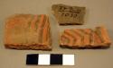 Black-on-red potsherds