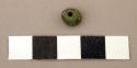 Ground stone bead, round