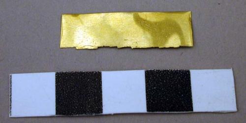 Metal, worked gold fragment