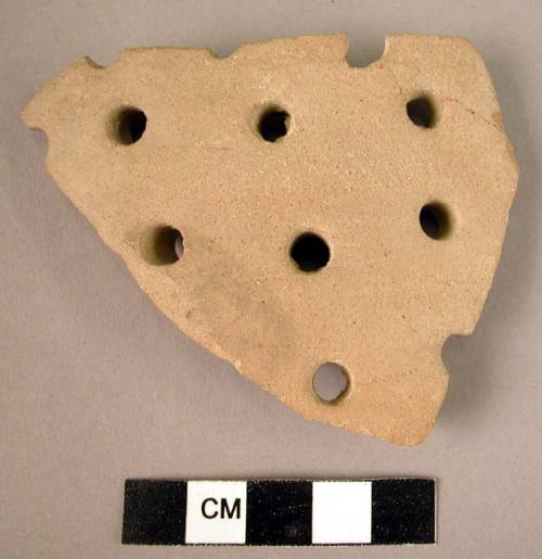 Potsherd - light colored, perforated