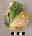 Pottery jar fragment, with place where handle was formerly attached