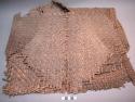 Organic, woven fiber, mat fragment, folded