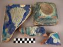 Ceramic tile fragments, blue, green, white glaze, vegetal design, some sherds
