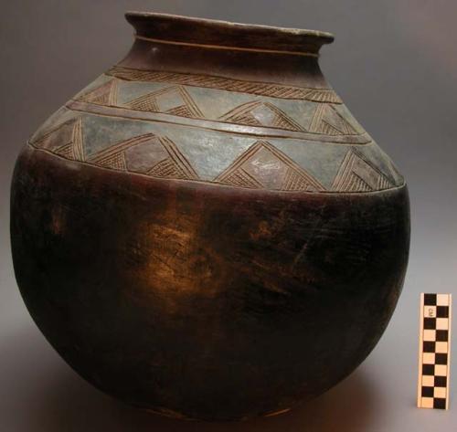 Large pottery vessel with incised designs. Nsuku