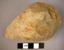 Well worked, pointed,  pebble-butted quartzite hand axe