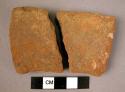 2 potsherds - outer surface red, inner surface black