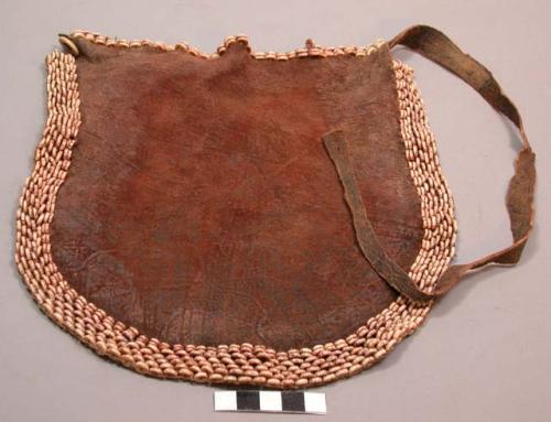 Pubic aprons of hide; all embroidered with beads made of ostrich eggshell d) 8