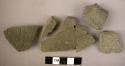 16 potsherds - gray ware, incised