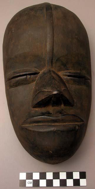 Wooden face mask, one of three