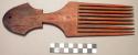 Red wood comb with hair parter