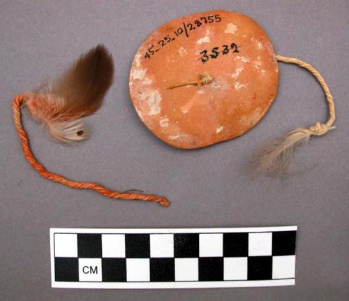 Ornament, brown & pink feather attached to pink cotton string