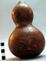 Bottle-necked gourd with carved design of birds, butterflies, & flowers