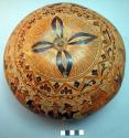Carved and painted gourd