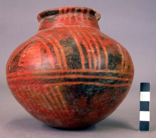 Pottery jar, red, black ornamentation extending to lower zone