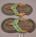 Pair of sandals, blue and yellow thongs, design on inner sole, North Sudanese. P