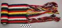 Woman's belt - green, red, black, white, blue stripes & fringes