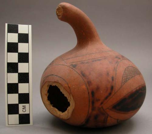 Brown burnished gourd with incised decoration