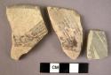 Ceramic body sherds, white slipped with red or black painted geometric design