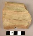 Rim potsherd - buff incised