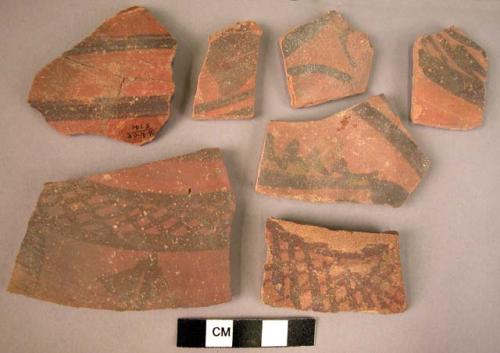 7 potsherds - black on red (B5)