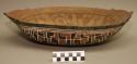 Earthenware dish with cord-impressed and polychrome designs on exterior and polychrome designs on interior
