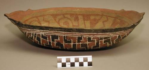 Earthenware dish with cord-impressed and polychrome designs on exterior and polychrome designs on interior
