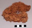 Box containing ground red wood (lukolo bark?) - used for coloring bodies