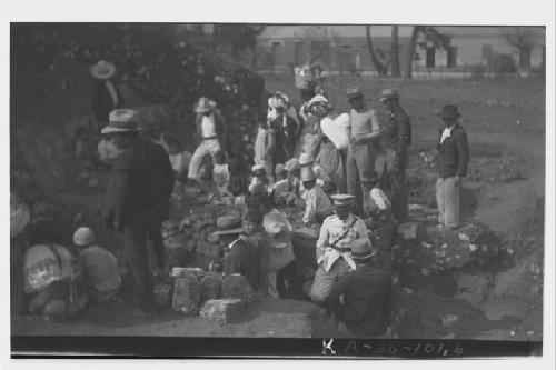 Mound I - Tomb II, crowd watching excavation.