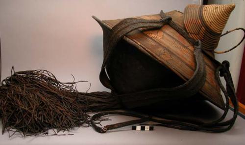 Food bowl with basketry cover and braided leather binding