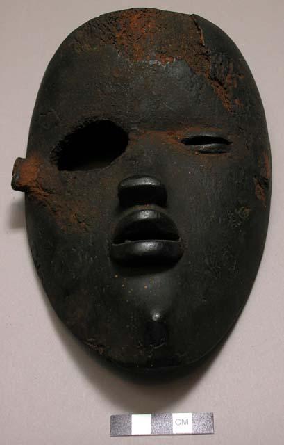 Wooden face mask.