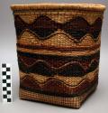 Basket, woven veg fiber w/reed base & rim, squared base, brn/natural waves