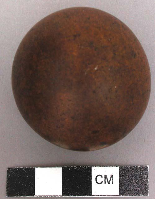 Smooth round stone from crocodile stomach, carried as hand piece+