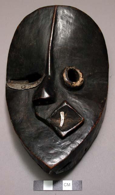 Black wooden mask (Gbena Glu) - one sided facial paralysis