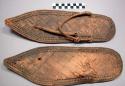 Organic woven fiber shoes, flat with upturned pointed tips, thong