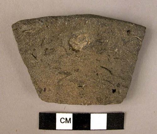 Ceramic rim sherd, corse undecorated black ware