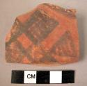 Rim potsherd - black on red (B1)