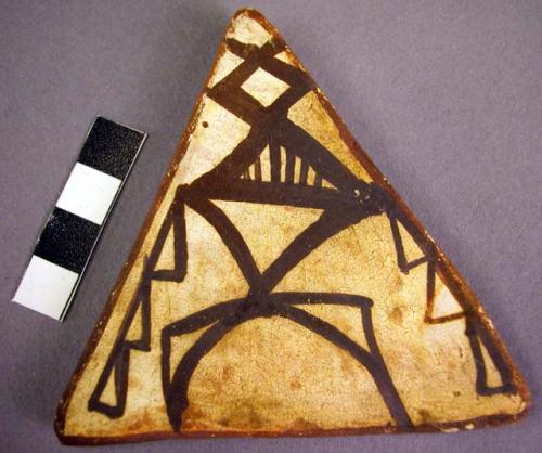 Triangular pottery tile