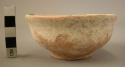 Pottery bowl; small; reddish-beige.