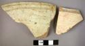 Ceramic rim sherds, white slipped ware with buff painted bands