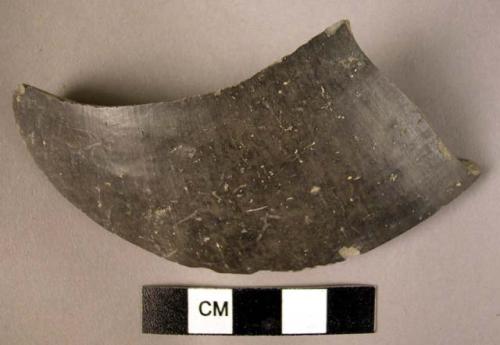 Polished body potsherd of grey ware