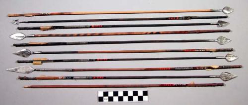 Arrows, miscellaneous metal points, 1 missing; wood shafts, paper fletch on some