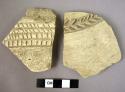 2 potsherds - incised ware