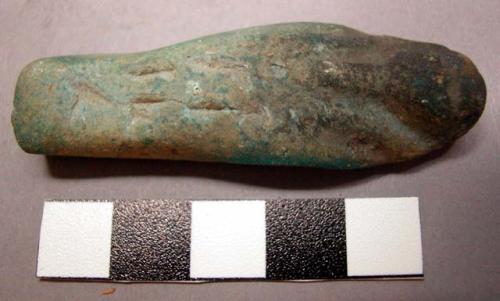 Ushabti or "respondent" 2 1/4" high, blue glaze.  Represents the god Osiris