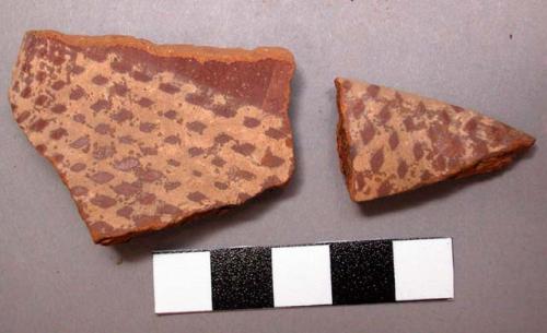 3 potsherds, red and buff?